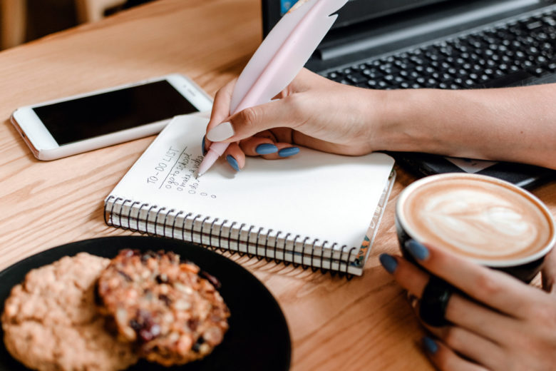 woman creating a checklist